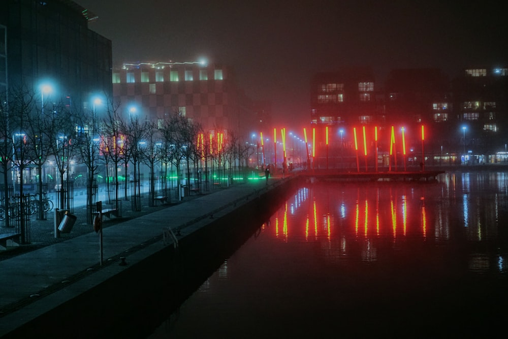 city with lights turned on during night time