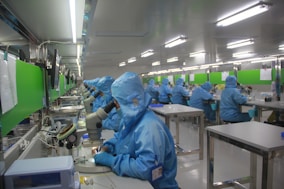 man in blue jacket wearing blue mask