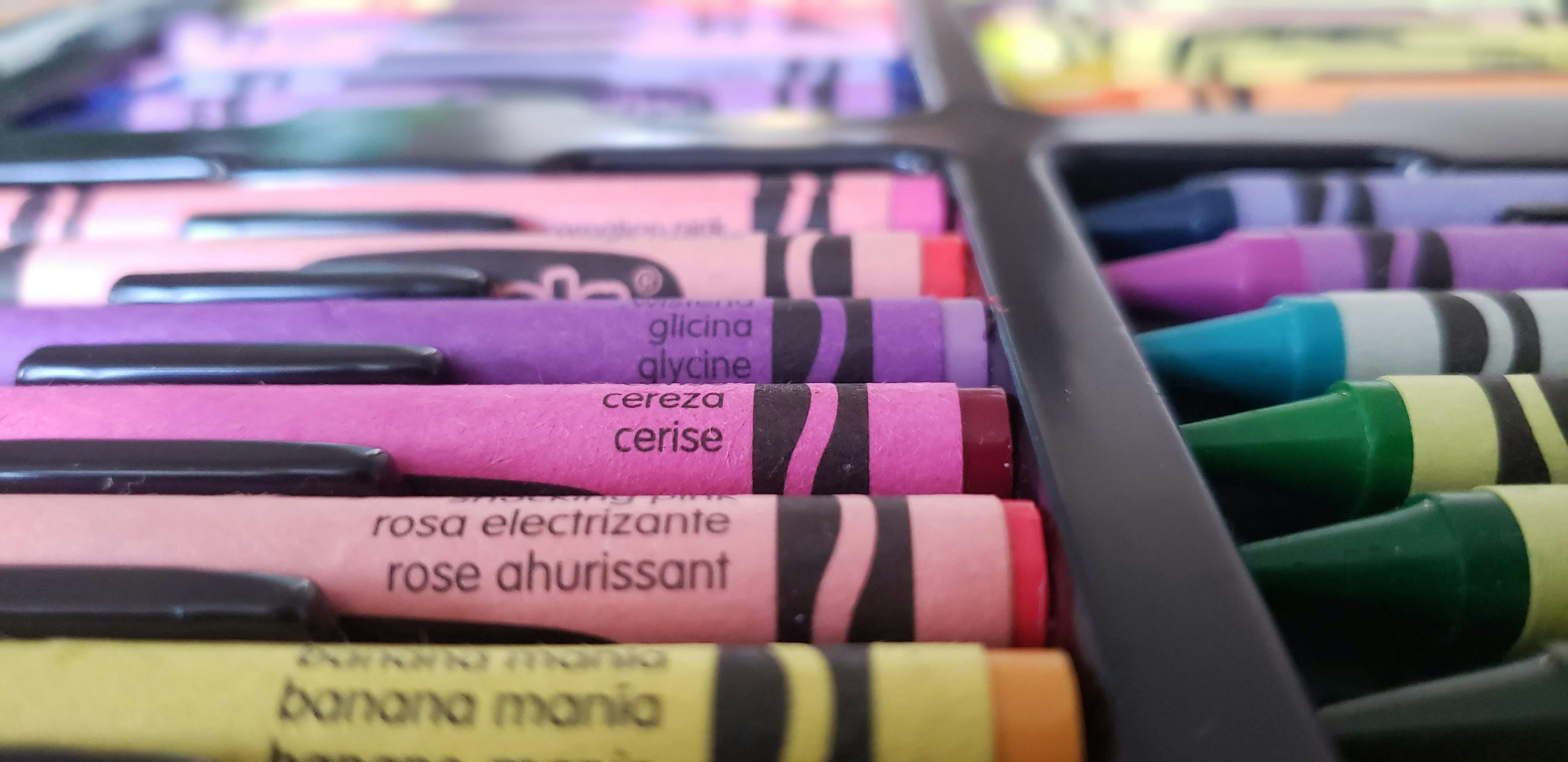 Box of colorful crayons for kids drawing