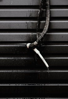 black and white metal pipe