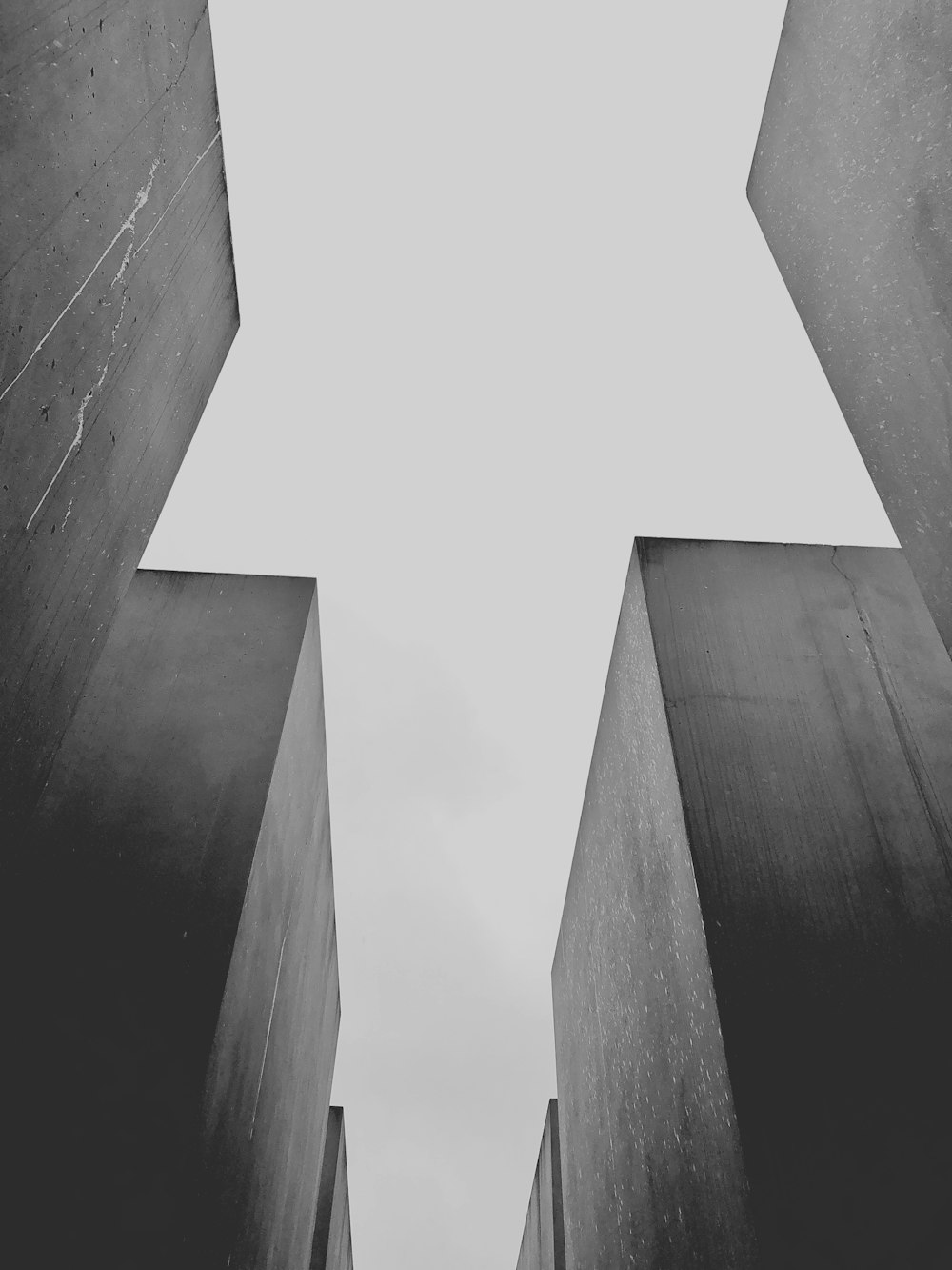 grayscale photo of concrete building