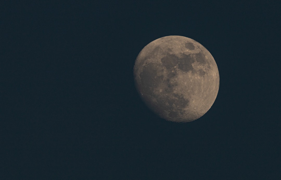 full moon in dark night sky