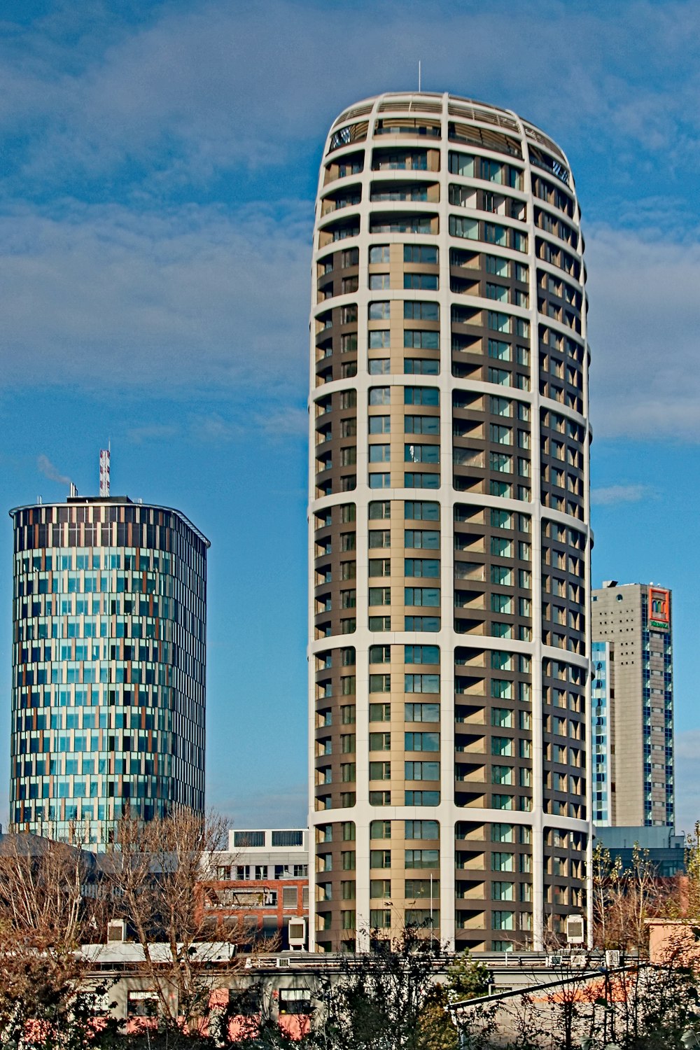 white and blue concrete building under blue sky during daytime