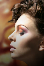 woman with brown hair and black eyes