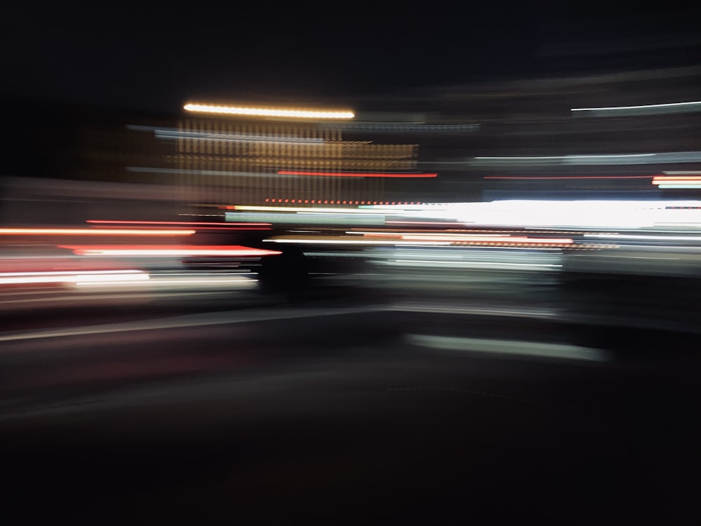 time lapse photography of cars on road during night time