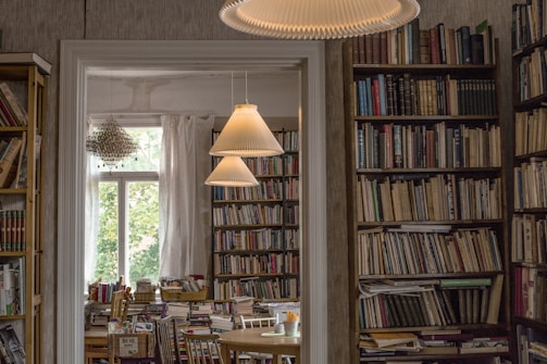 A cozy room filled with books and warm lighting for quiet reflection.