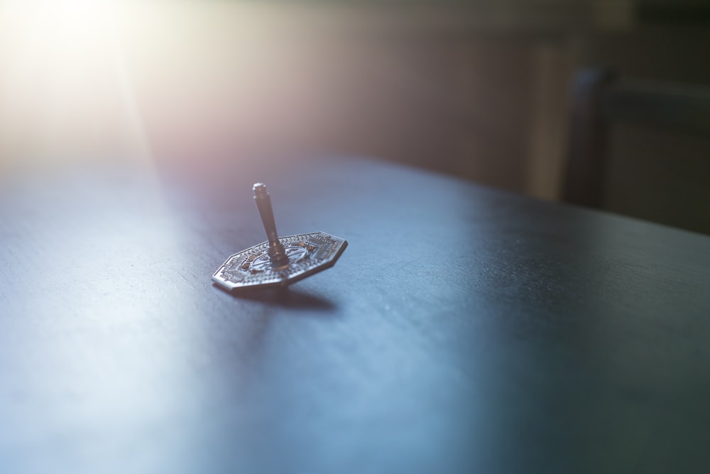 brown wooden stick on white table