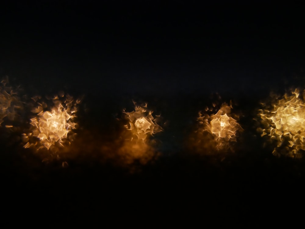 orange and black lightning during night time