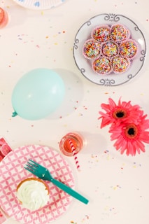 pink and white floral ceramic plate