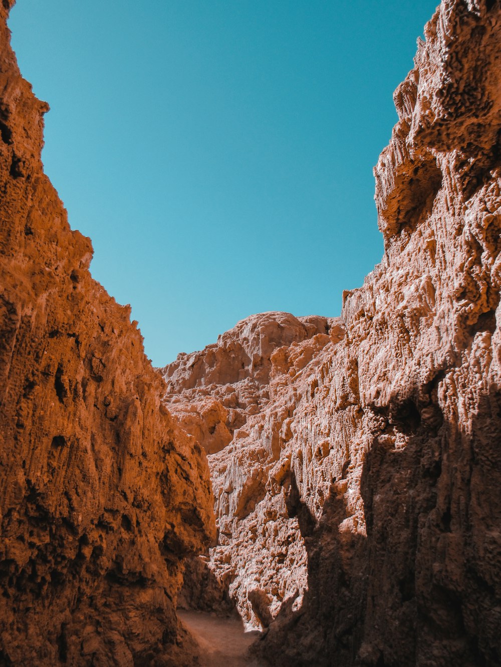 brown rocky mountain under blue sky during daytime