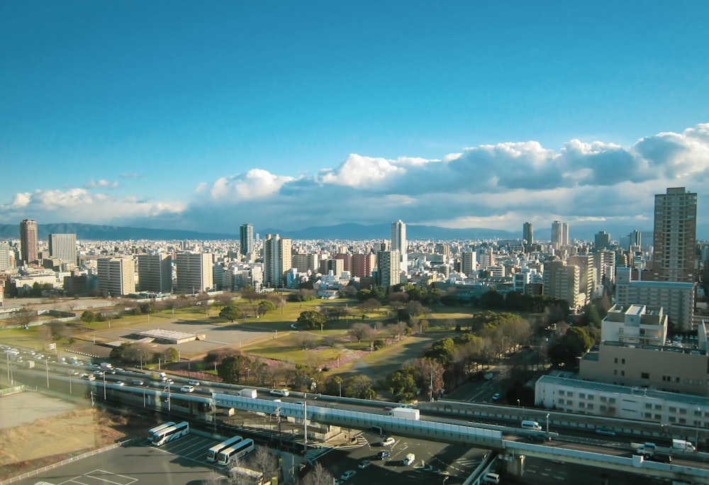 city buildings under blue sky during daytime