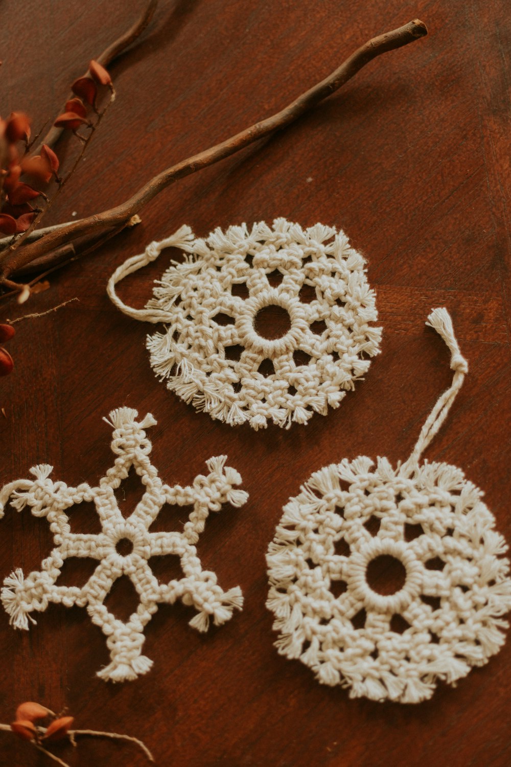 white knit textile on brown wooden table