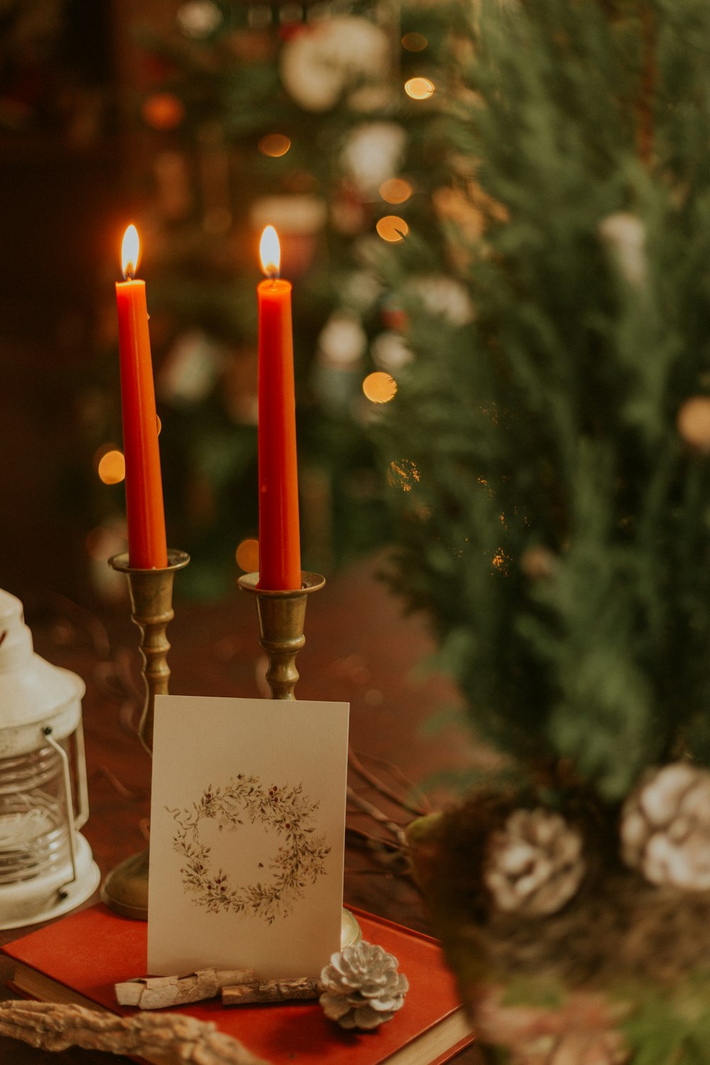 white candle holder with red candle