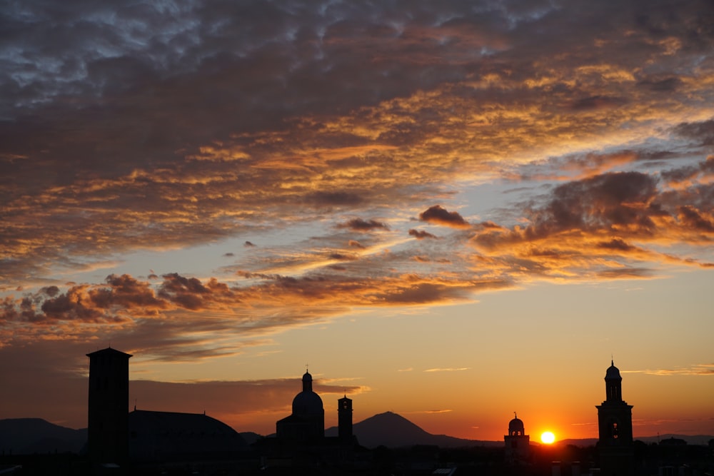 silhouette of building during sunset