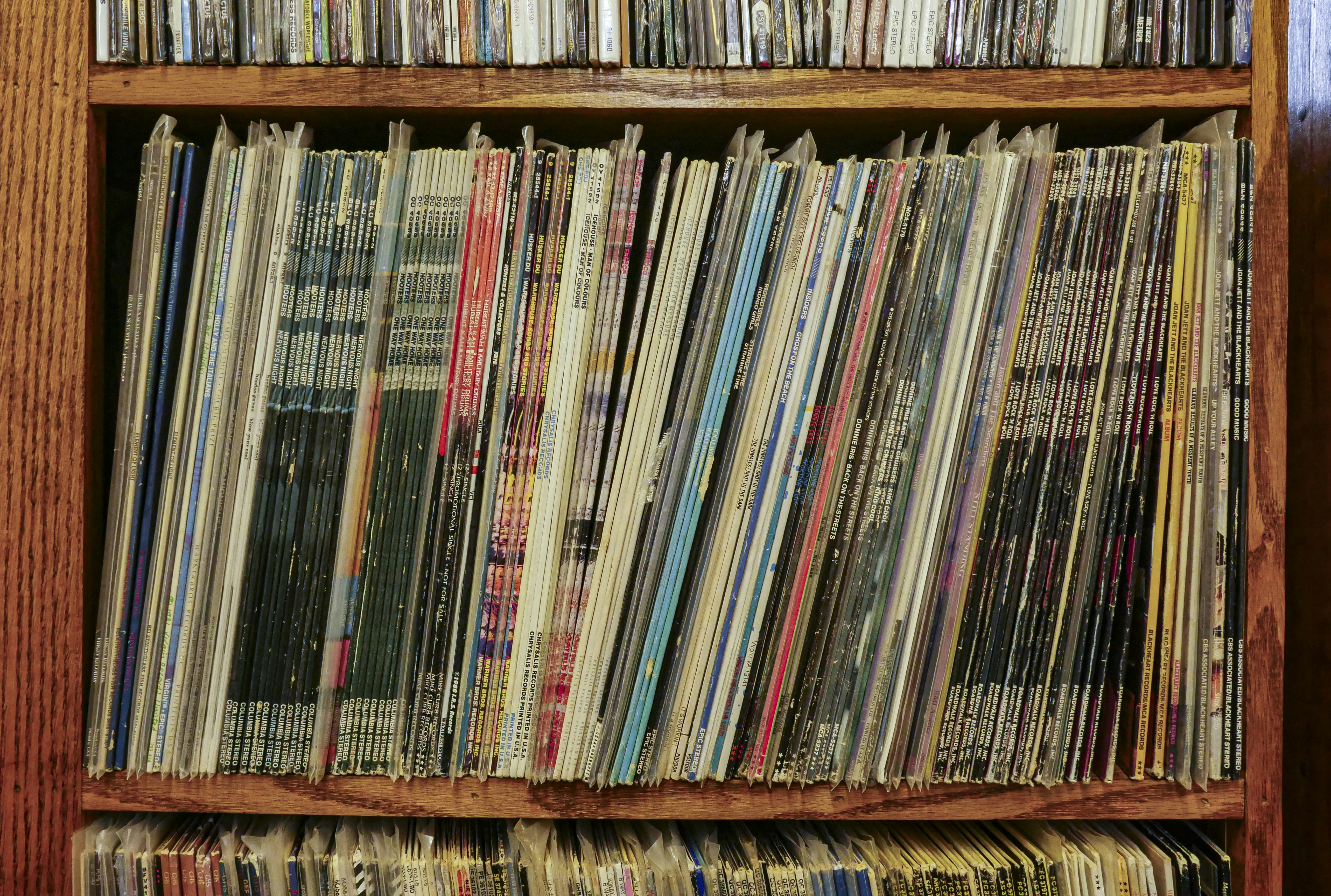 books on brown wooden shelf