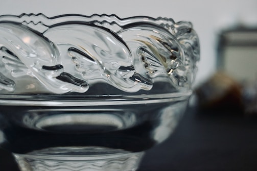 An elegant bowl featuring ocean-inspired resin designs.