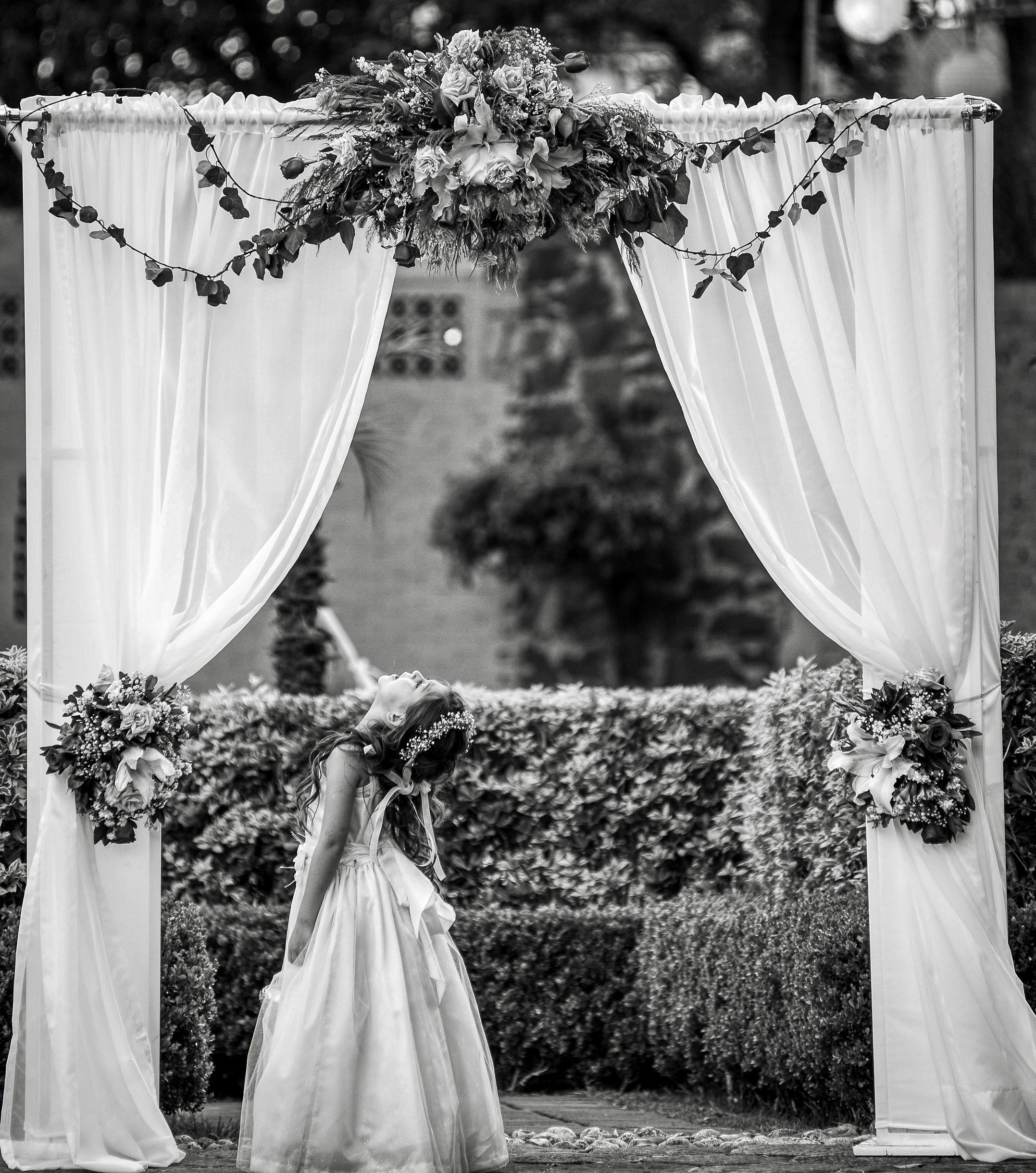 white textile on brown and black floral couch
