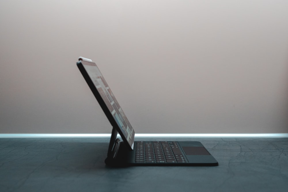 black and silver laptop computer