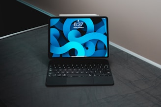 black tablet computer with keyboard