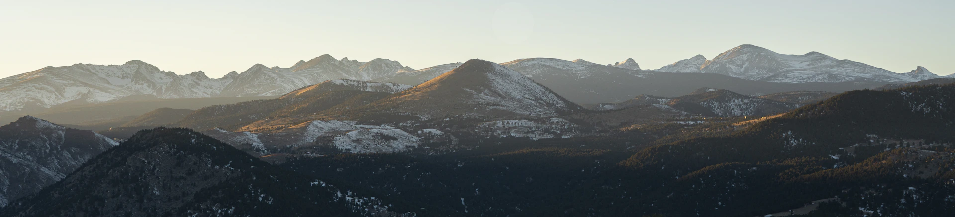 brown and black mountains under blue sky during daytime