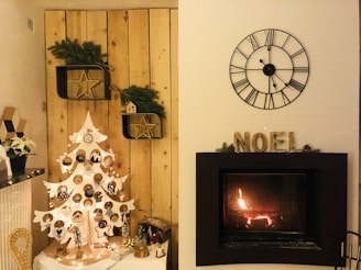 Cozy living room corner adorned with warm-toned Christmas decorations from Seasonal Nest
