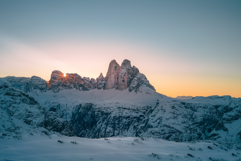 snow covered mountain during daytime