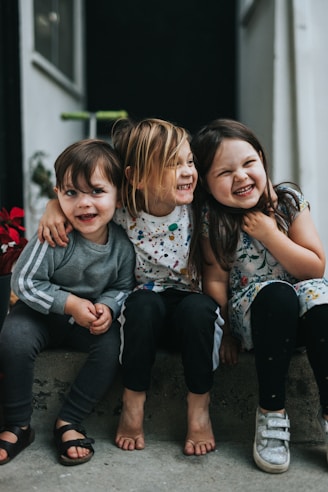3 girls sitting on floor
