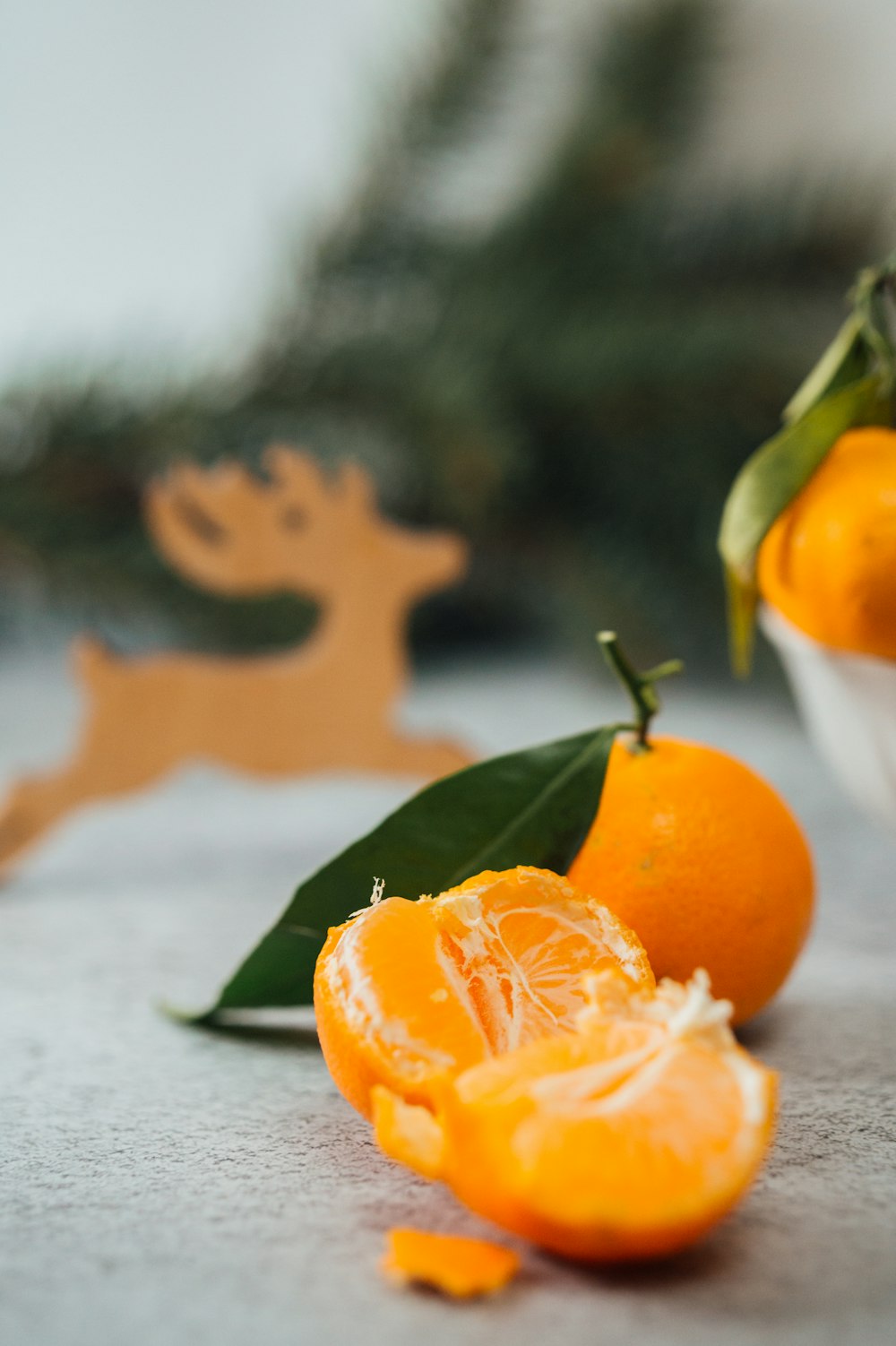 orange fruit on gray wooden table