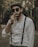 man in white dress shirt wearing black sunglasses
