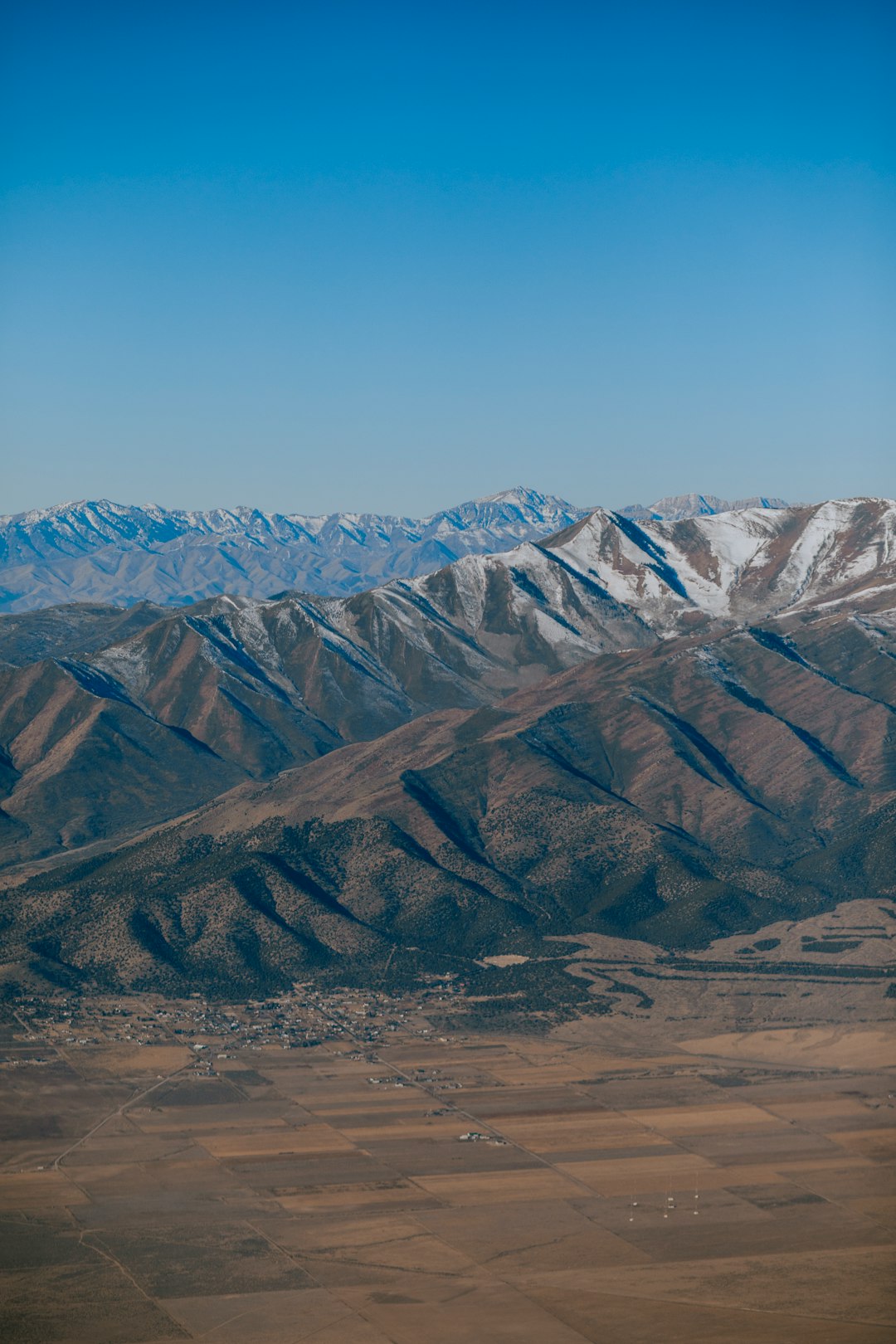 brown and gray mountains under blue sky during daytime