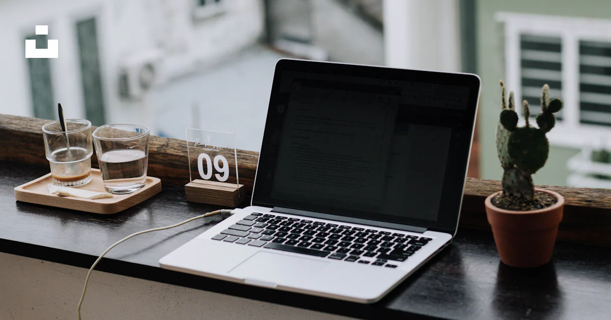 Macbook pro on white table photo – Free Laptop Image on Unsplash