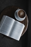 white book page on brown wooden table