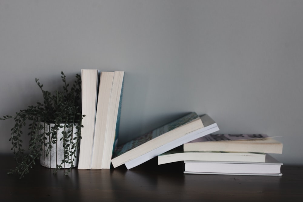 white printer papers on brown wooden table