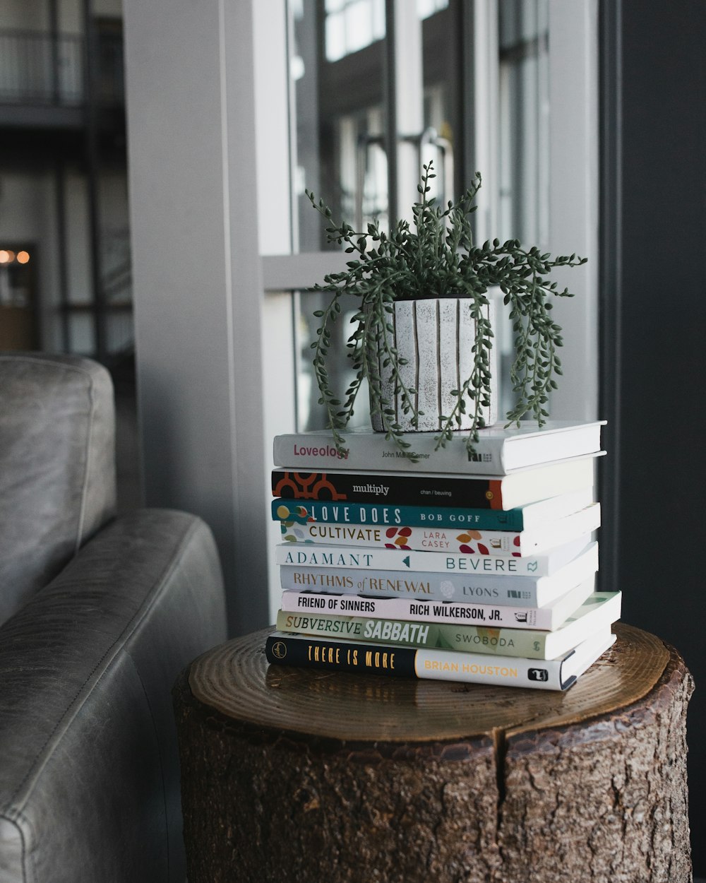 books on brown wooden round table