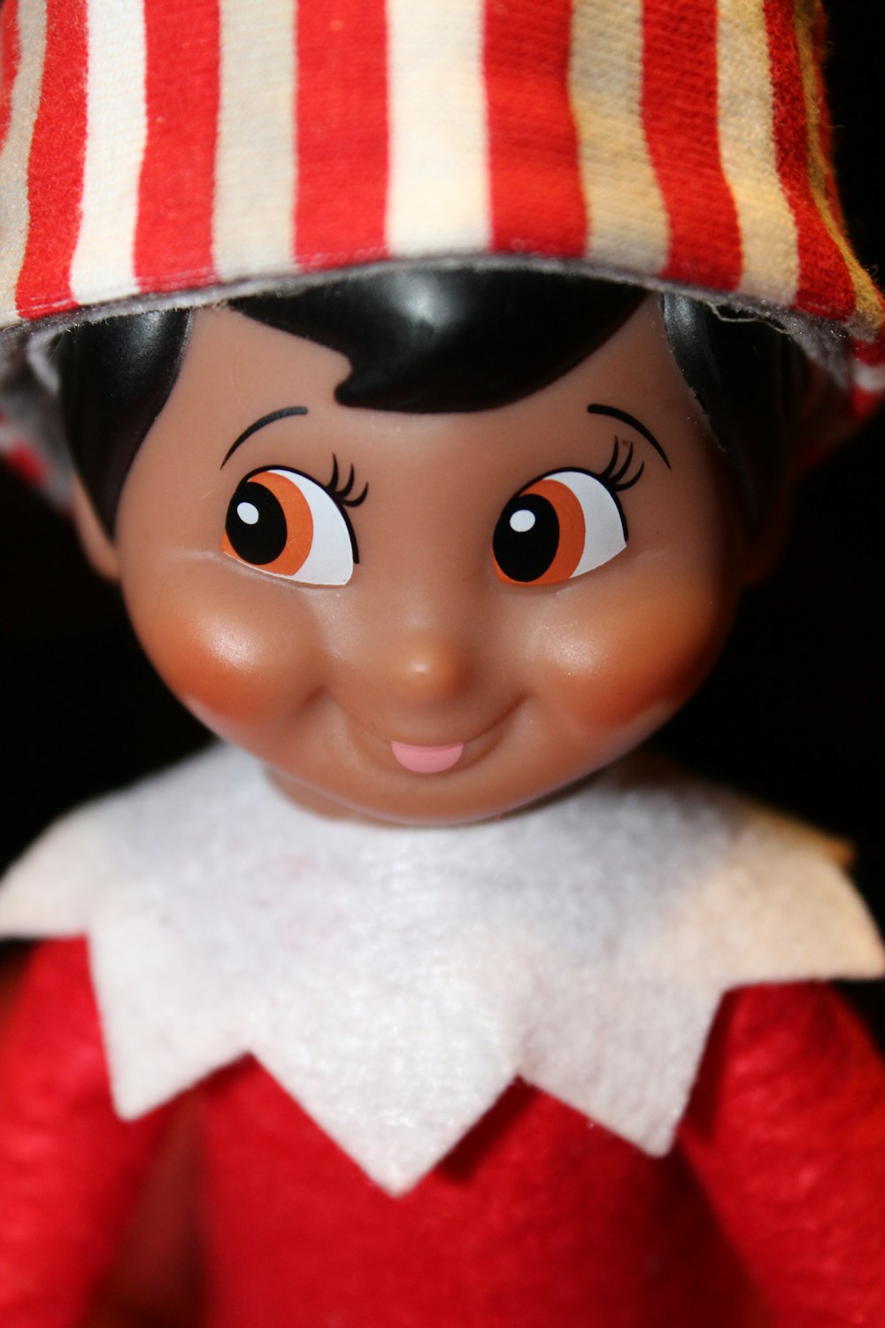 baby doll in white and red dress