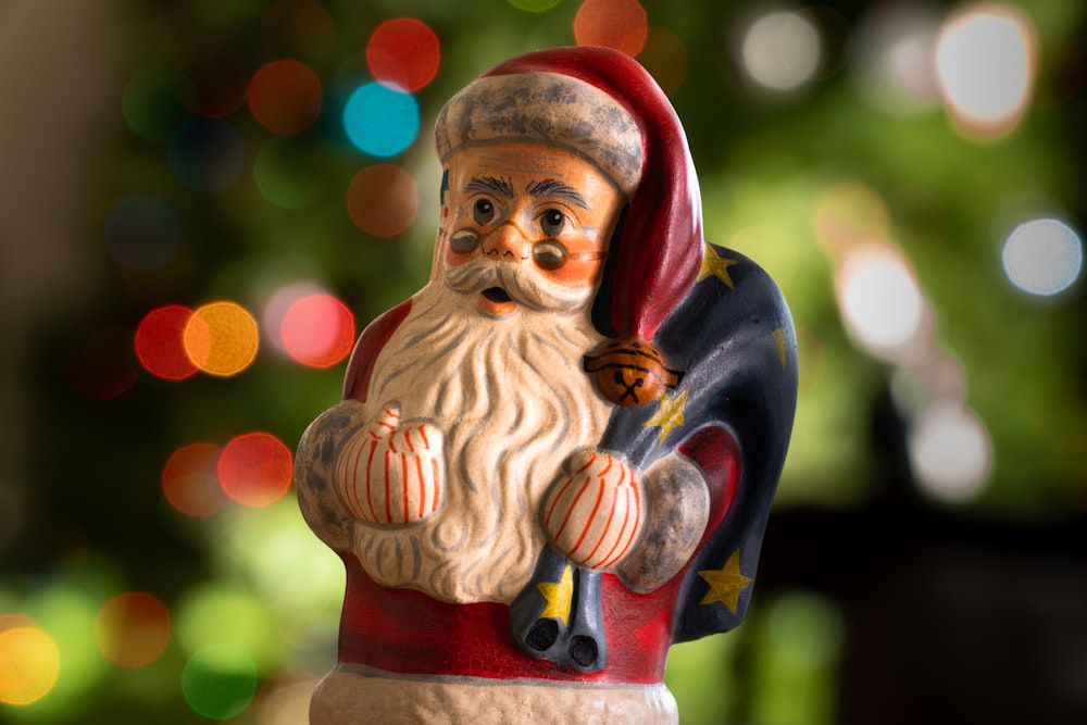 red and brown ceramic figurine