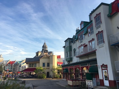 A charming street view of the local village with colorful buildings and visitors.
