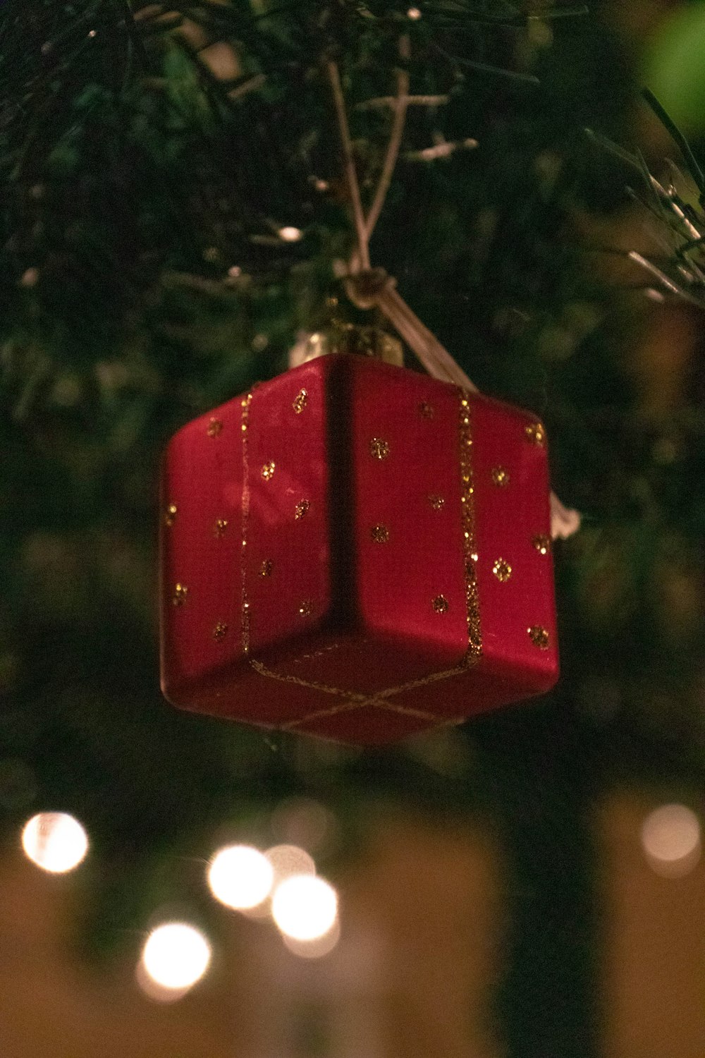 red pendant lamp in tilt shift lens