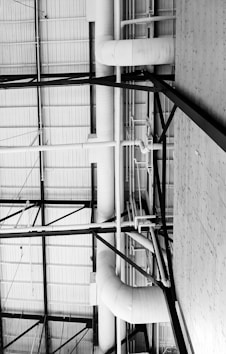 white metal frame on white concrete wall