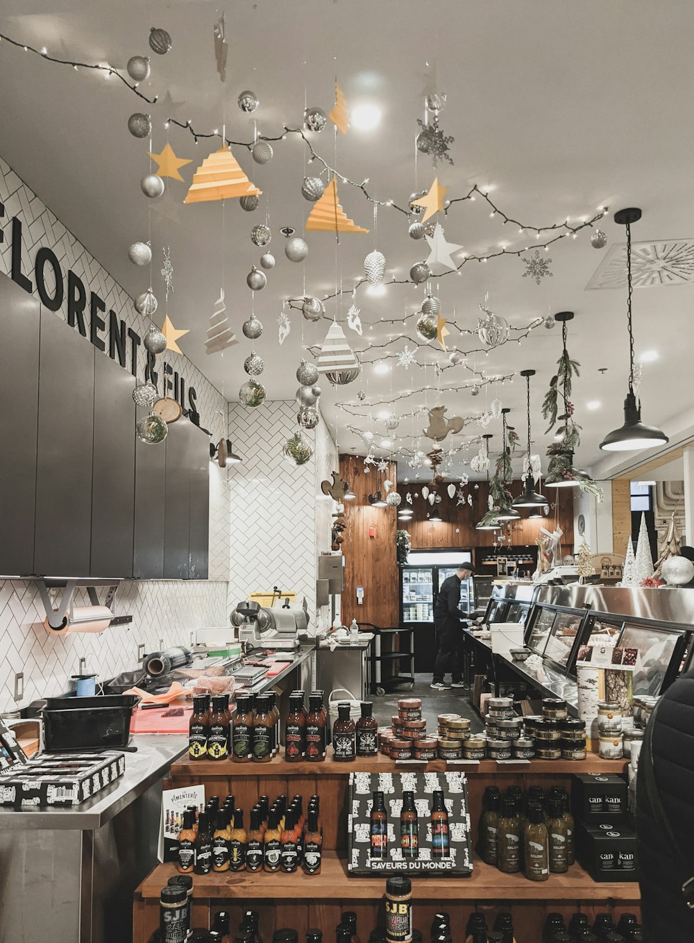 people in restaurant with pendant lamps