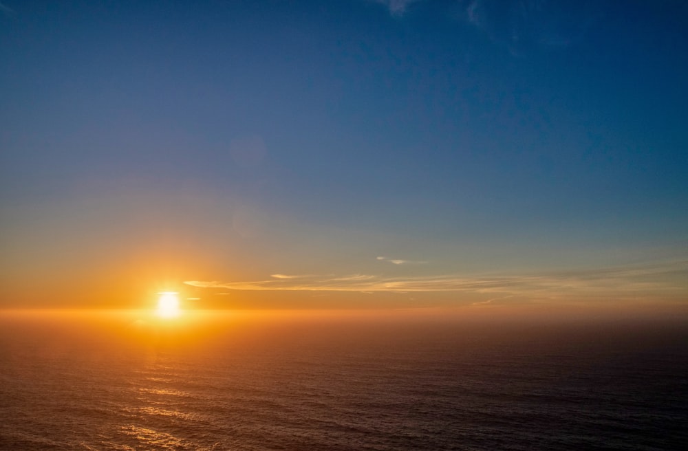 blue sky and white clouds during sunrise