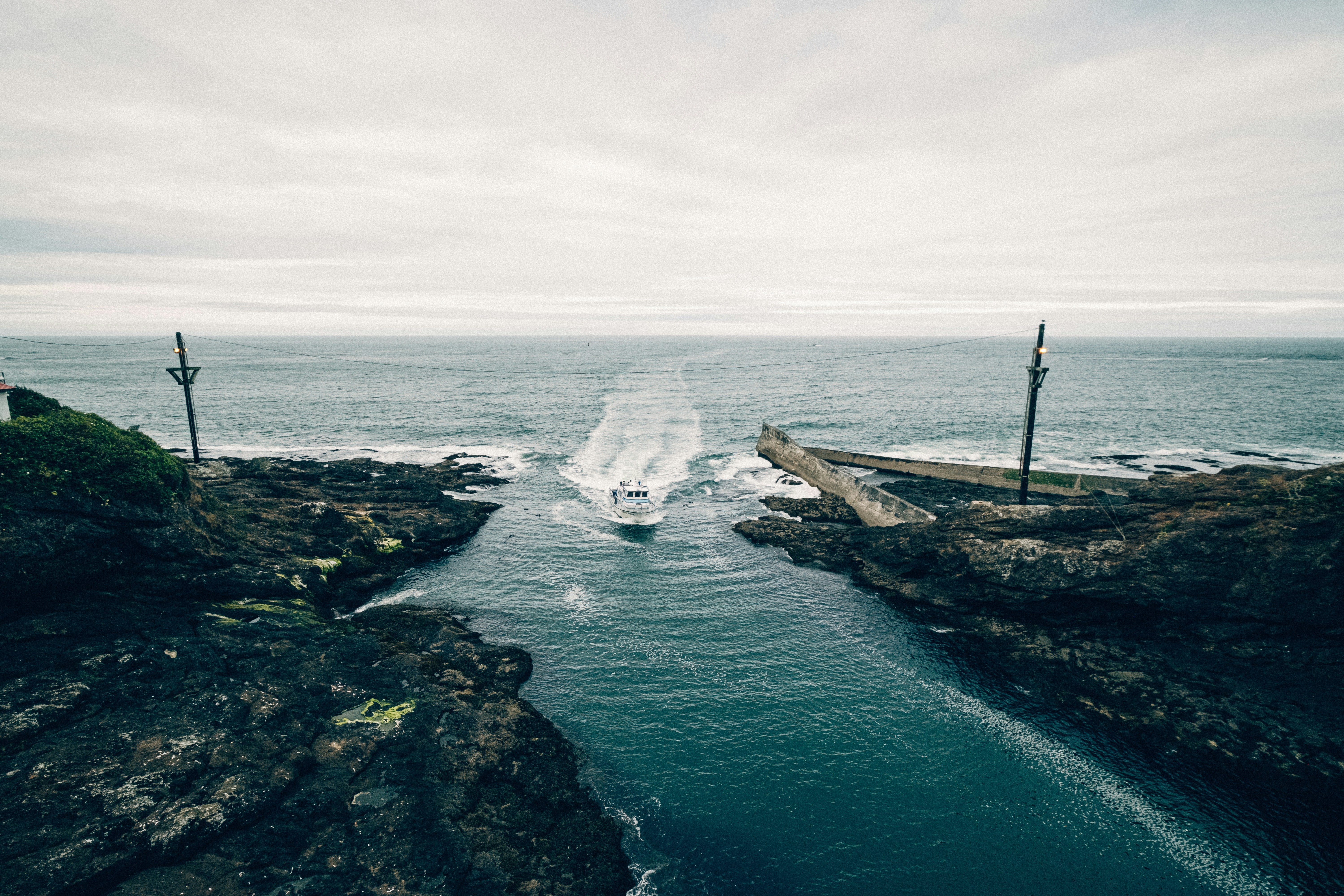 white sailboat on sea during daytime