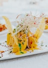 yellow and green vegetable on white ceramic plate