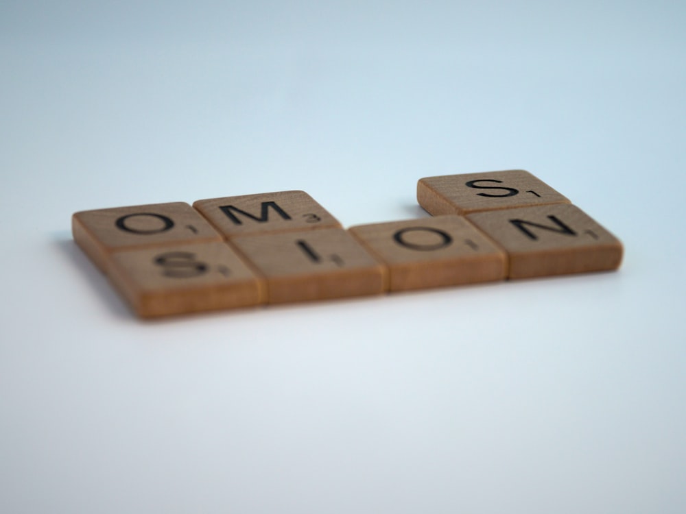 brown wooden blocks on white table