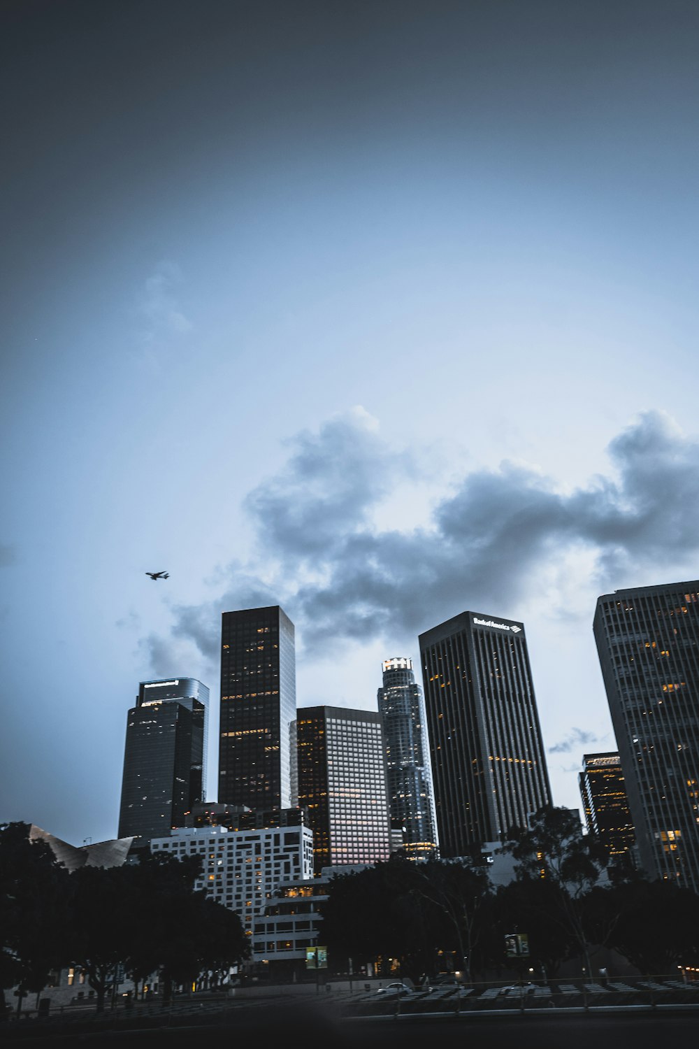 high rise buildings under gray sky