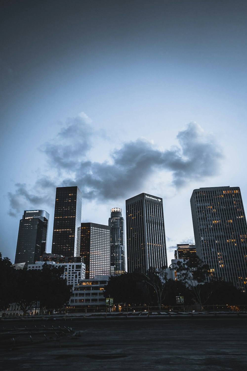 city buildings under gray clouds during daytime