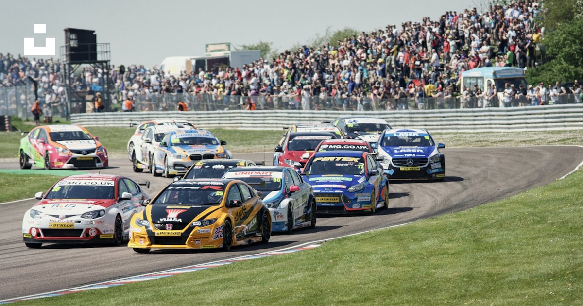 Blue and red racing cars on track during daytime photo – Free Grey ...
