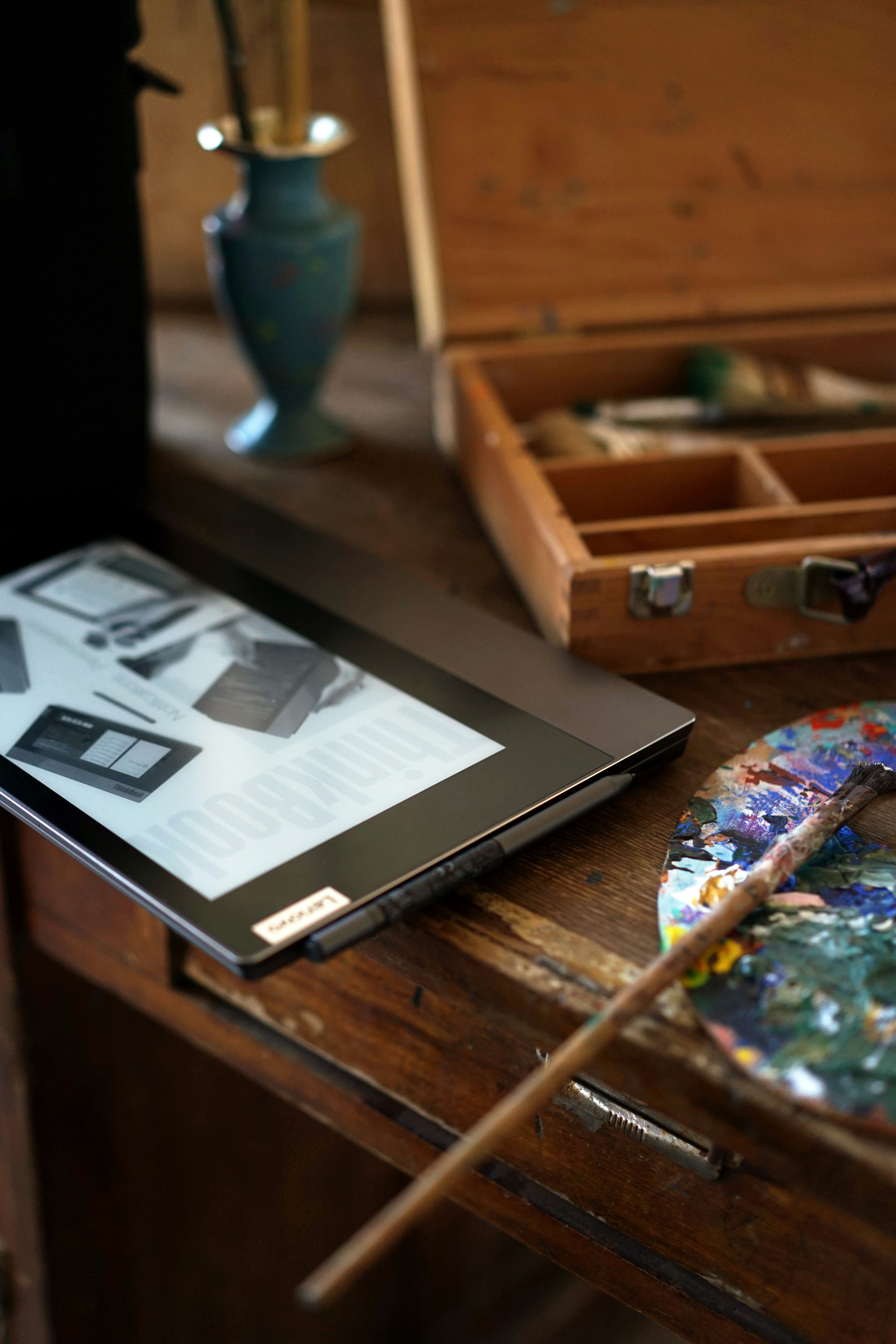 white printer paper on brown wooden table