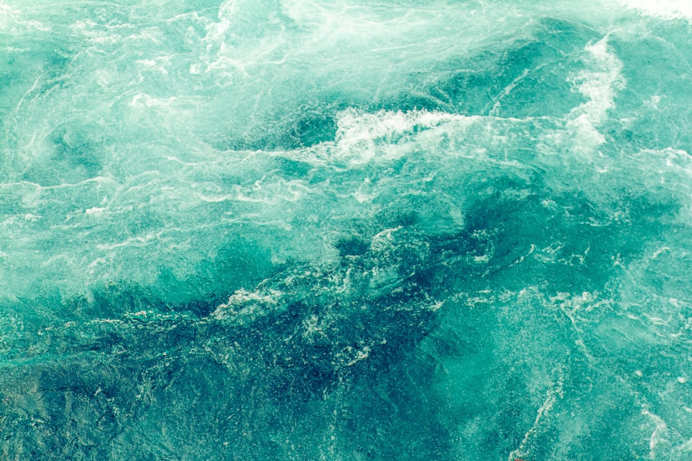 green and white water waves