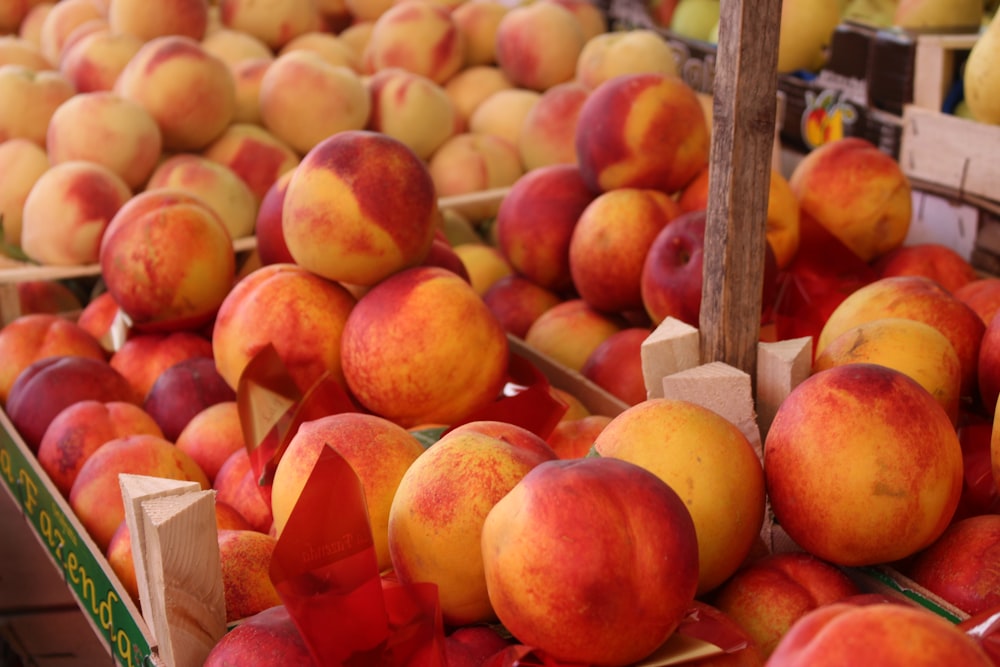 red apples on brown wooden crate